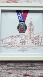 Framed Marathon Medal Over Skyline Drawing of Cork City