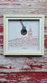 Framed Marathon Medal Over Skyline Drawing of Cork City