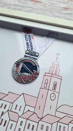 Framed Marathon Medal Over Skyline Drawing of Cork City