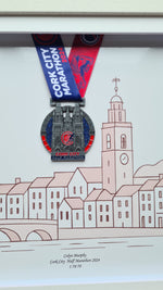 Framed Marathon Medal Over Skyline Drawing of Cork City