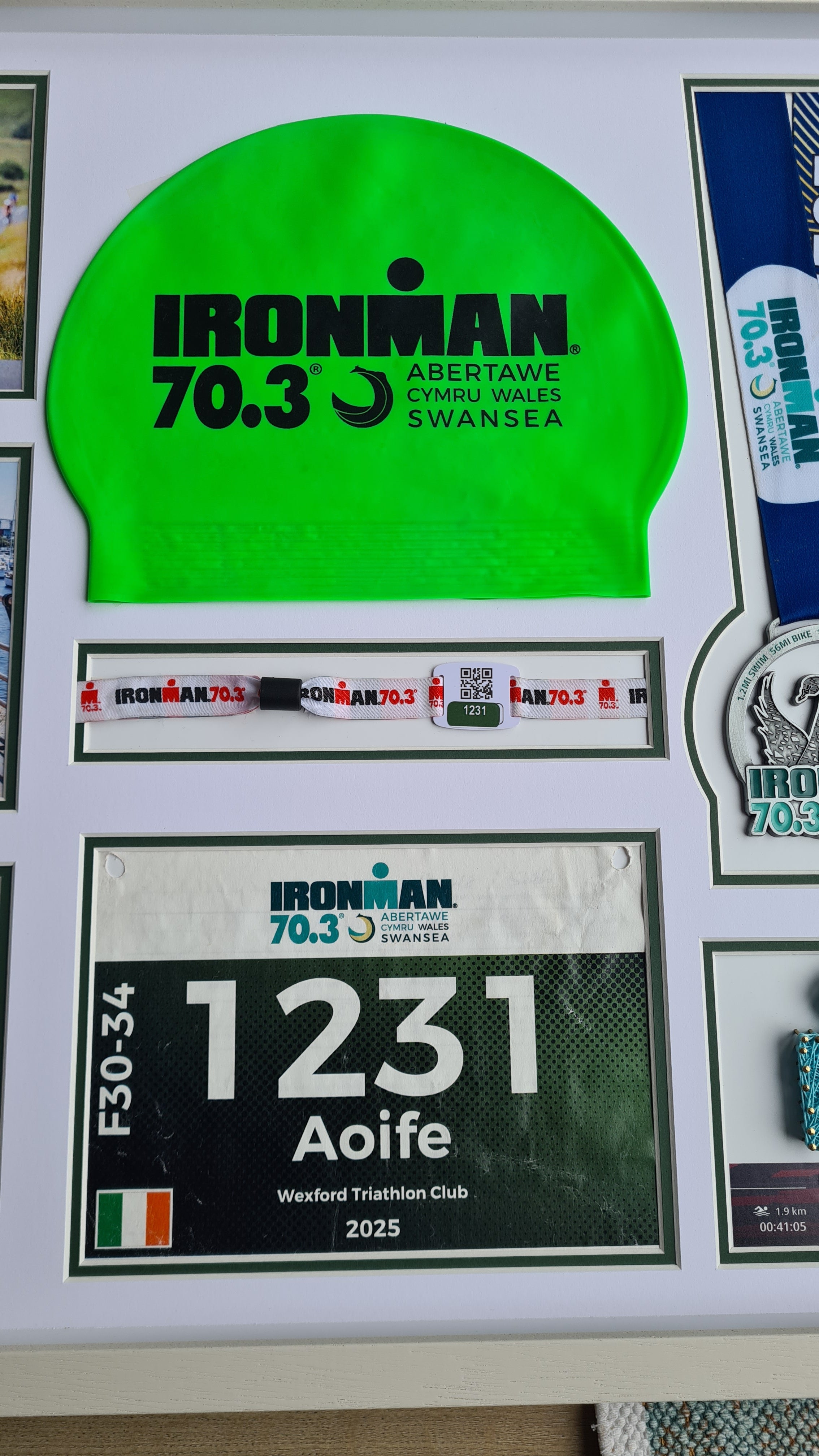 Iron-man Frame including medal, hat, race number and wrist band.