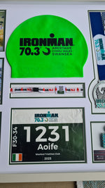 Iron-man Frame including medal, hat, race number and wrist band.