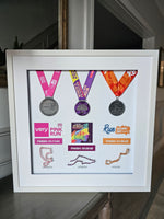 10k Running Race Medals Over Stringart Routes