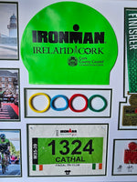 Iron-man Frame including medal, hat, race number and wrist band.