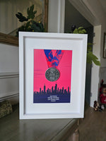 Framed Marathon Medal Over City Skyline