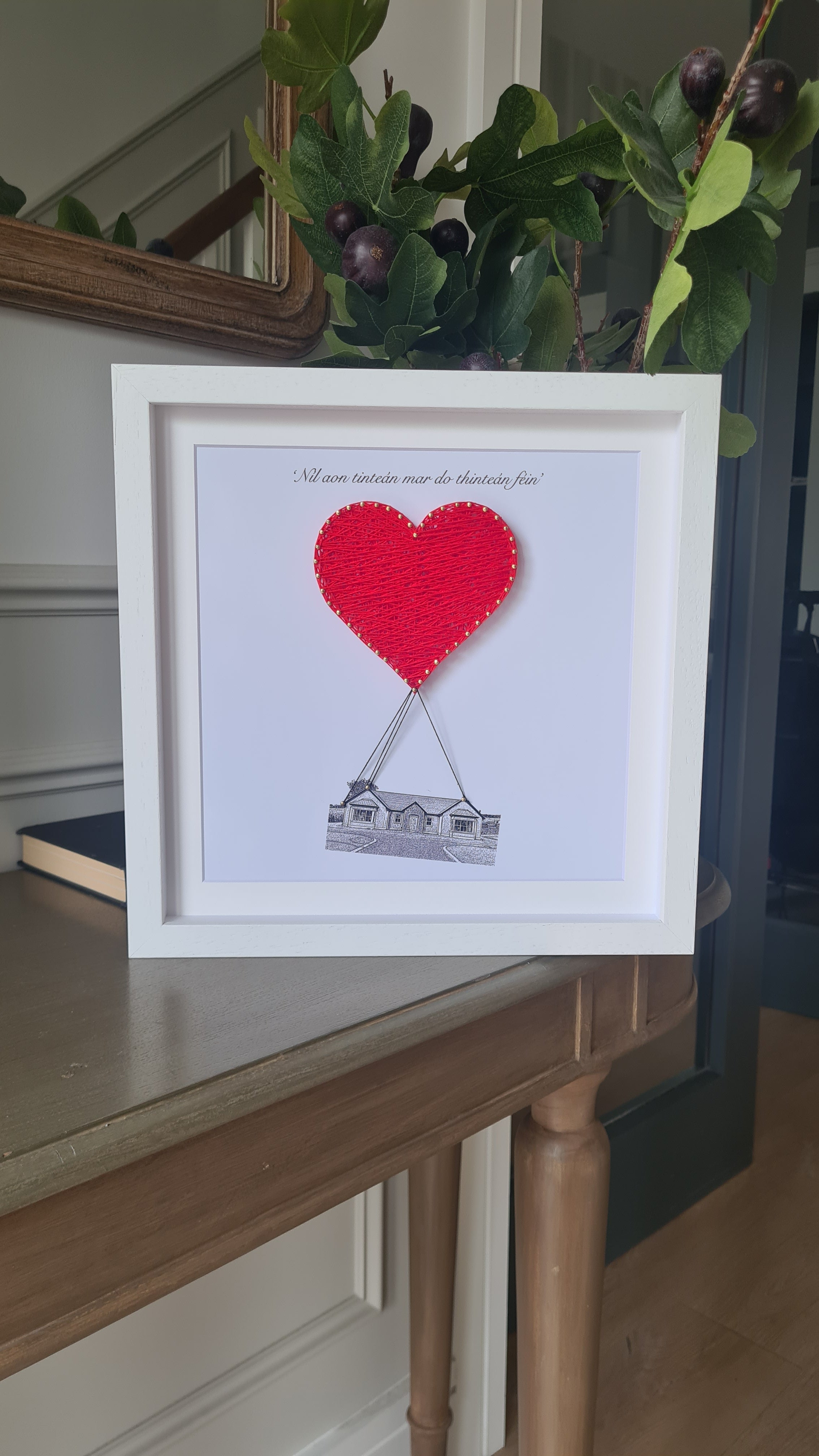 Housewarming gift with sketch graphic of new home