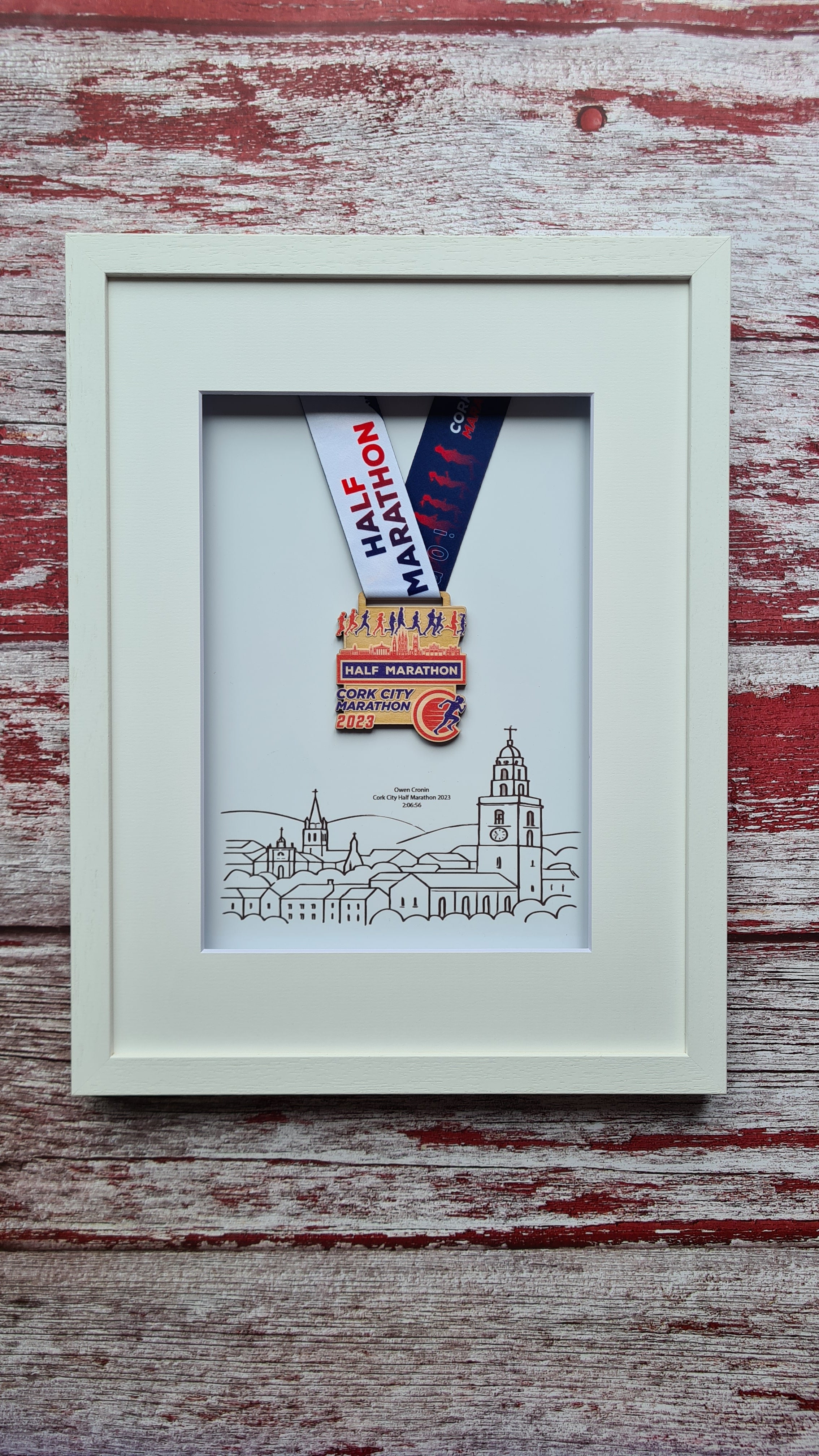 Framed Marathon Medal over Skyline Drawing of Cork City
