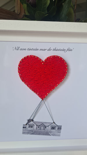 Housewarming gift with sketch graphic of new home